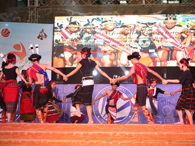 PARTICIPATING IN TRIBAL DANCE OF NAGALAND